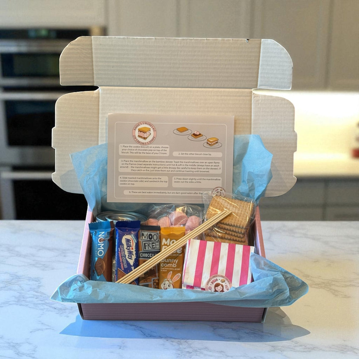 Open vegan s’mores kit on a kitchen worktop